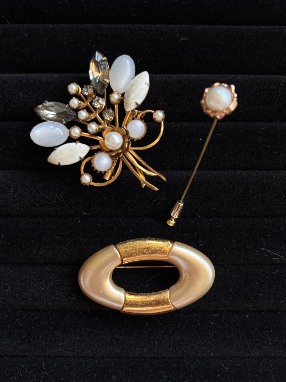 Vintage Gold and white brooches
